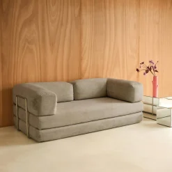 Sofá cama con futón plegable en pana y estructura cromada, 3 plazas