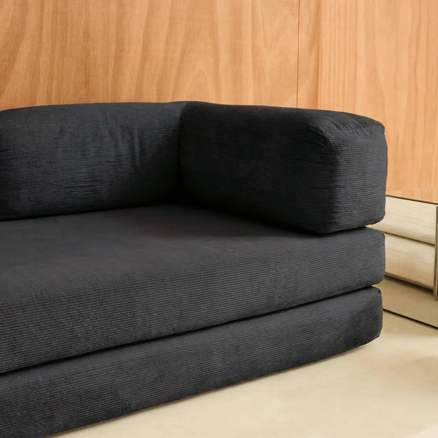 Sofá cama con futón plegable en pana y estructura cromada, 3 plazas