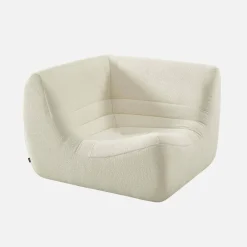 Sofá esquinero modular con reposapiés de borreguito texturizada, 5 plazas