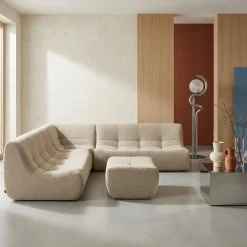Sofá esquinero modular con reposapiés de borreguito texturizada, 7 plazas